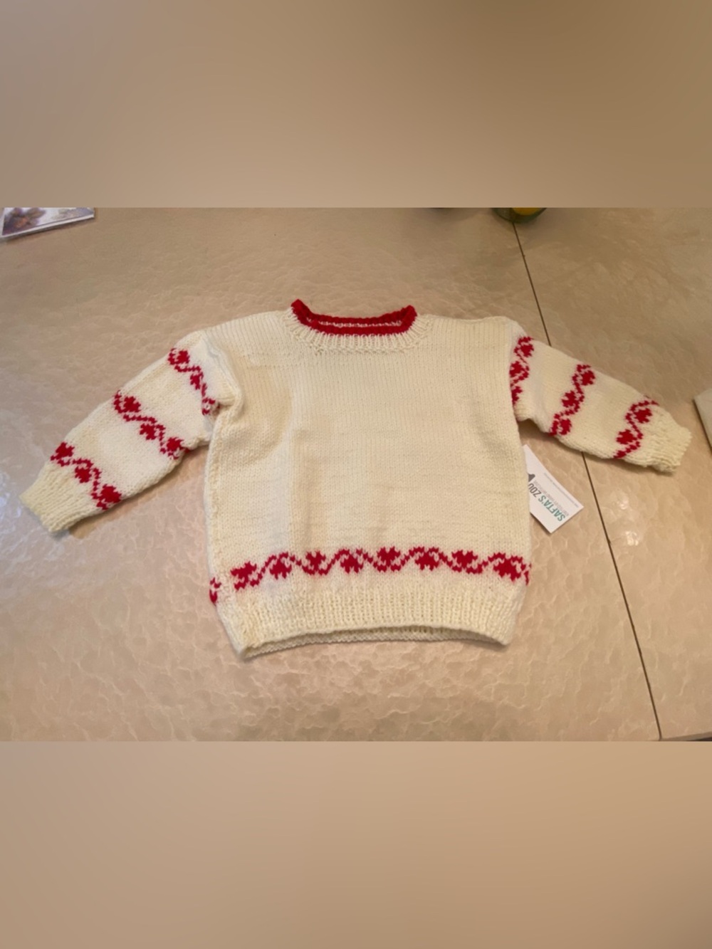 Kids Cream Sweater with Red Accent. Acrylic knit